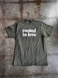 Make a statement with this top-notch Rooted In Love Adult Box T-Shirt! Show off your Christian faith in a fun and stylish way with the acid wash design and the bold “Rooted In Love” message. With this awesome tee, you’ll be looking – and feeling – great! Rooted Christian Shirt, Rooted In Love, Love Message, Boxing T Shirts, Love Messages, Christian Faith, Acid Wash, Cool Tees, Feeling Great