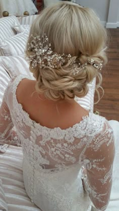 the back of a bride's head wearing a wedding dress