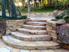 stone steps lead up to a garden area