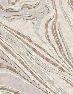 a beige and brown rug with wavy lines on it