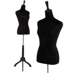 a black mannequin is standing on a tripod