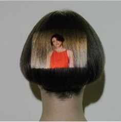 a woman's hair has been cut into the shape of a man's head