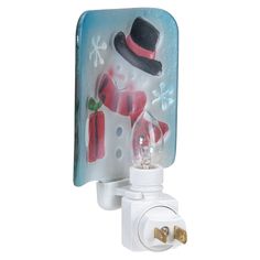 a light switch cover with a snowman and presents on it's glass cover