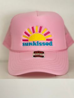 Embroidered "Sunkissed" Pink Trucker Hat Spring Summer Trucker Hat, Spring Beach Trucker Hat With Flat Brim, Trendy Summer Trucker Hat With Embroidered Logo, Trendy Embroidered Trucker Hat, Trendy Embroidered Trucker Hat For Summer, Trendy Embroidered Beach Hat, Trendy Embroidered Logo Baseball Cap For Summer, Summer Visor Trucker Hat, Trendy Summer Baseball Cap With Embroidered Logo