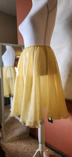 "Time to hit the dance floor! This beautiful golden yellow crinkled chiffon skirt is perfect for fall and sewn to a 3/8\" cotton elastic waistband to provide stretch and comfort. It is a full circle skirt perfect for rehearsals or even the stage!  Skirt measures 22\" in length and fits a M/L adult waist.  While Kaleidoscope Dancewear items are made in a smoke-free home, the creative space is shared with a large and hairy canine friend. I cannot guarantee that products will be free from \"puppy g Full Circle Skirt, Womens Sports, Full Circle Skirts, Beautiful Skirts, Chiffon Skirt, Full Circle, The Dance, Circle Skirt, The Stage