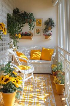 the sun shines brightly through the windows on this sunny porch with white wicker furniture and potted plants