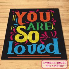 you are so loved mat with colorful lettering on the front and bottom, which says you are