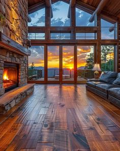 a living room filled with furniture and a fire place in front of a large window