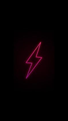 a neon pink lightning bolt on a black background