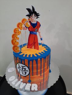 a dragon ball themed birthday cake with the theme of gohan and his name on it