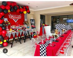 a party with red, black and white decorations