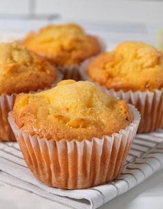 some muffins are sitting on a cooling rack