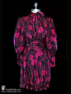 "BIG NEWS After 22 years, our website, TheFROCK.com, has had a makeover. Check out the new site, and join our mailing list for new arrivals.  Ungaro, Parallèle black and magenta floral silk day or evening dress with pussybow neck and semi-bubble hem. Removable shoulder pads, zippered sleeve cuffs, rear dress zipper, georgette and habotai liners. Measures bust 37\", waist 27\", length 40\", sleeve length 25\" (darted wrist is fitted in the manner of a bishop sleeve so it will fit all shorter slee Bow Dresses, French Couture, Silk Cocktail Dress, Emanuel Ungaro, Vintage Fur, Bishop Sleeve, Dress Zipper, New Instagram, Dress Clothes For Women