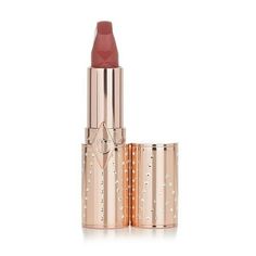 Charlotte Tilbury Matte Revolution Refillable Lipstick (Look Of Love Collection) - # Mrs Kisses (Golden Peachy-Pink) A hydrating matte lipstick Contains anti-oxidant Lipstick Tree & Orchid Extract to soften & condition lips Blended with 3D glowing pigments to create a wash of intense color Plus a blend of oils, triglycerides & waxes to provide buildable, long-lasting color for up to 10 hours Creates kissably supple, hydrated lips with a matte finish The square, angled tip mimics the shape of you Lip Blending, Charlotte Tilbury Matte Revolution, Lip Brush, Lip Hydration, Peachy Pink, Matte Lipstick, Makeup Lipstick, Charlotte Tilbury, Intense Colors