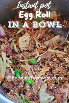 a bowl filled with meat and vegetables on top of a table