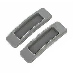 two gray plastic door handles for a car