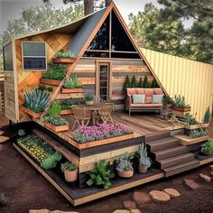 a house made out of wood and plants