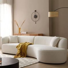 a living room with a large white couch