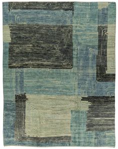 an area rug with different colored squares on it