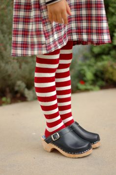 plaid, flowers stripes, mustard, and clogs Sven Clogs, Baby Boy Haircuts, Kids Clogs, Fashion Feminine, Baby Bangles, Striped Tights, Clogs And Mules