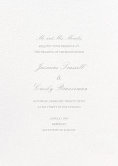 the wedding stationery is shown in white paper