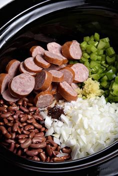 the food is prepared and ready to be cooked in the crock pot for dinner