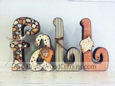 decorative wooden letters spelling out the word fall