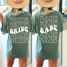 the back of a woman's green shirt that says bride babe, and is wearing a cowboy hat