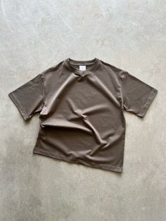 THE PERFECT TEE (BROWN). 250 GSM crew neck t-shirt is cut to a slightly boxy unisex fit. Detailed with a woven tag at neck line. Crafted from 100% cotton with a soft peached finish. *READY TO SHIP NEXT DAY* Brown Tee, Neck T Shirt, Crew Neck, T Shirt, Quick Saves