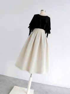 <Size>

 *Unit: cm 







 size 

 Waist 

 Length 











 S 

 64 

 68 






 M 

 68 

 68 






 L 

 72 

 69 






 XL

  76 

 69 






 2XL 

 80 

 70 













 <Material> 



 Wool Blend White A-line Skirt For Fall, Chic Winter A-line Pleated Skirt, Beige A-line Pleated Skirt For Fall, Cream Lined Skirt For Fall, A-line Skirt For Office In Spring, Elegant White Tweed Skirt, White Midi Skirt For Fall, Spring Office A-line Skirt, Chic Cream Fall Skirt