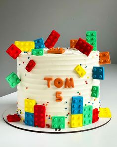 a birthday cake with legos on it and the words not 5 is spelled in white frosting