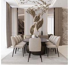 a dining room table with chairs and a chandelier hanging from the ceiling above it