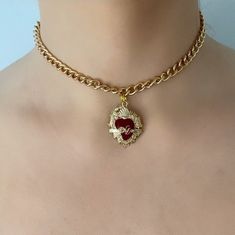 Are you looking for the perfect necklace for this fall season? My red and gold sacred heart choker necklace is a unique piece of handmade jewelry to wear and to gift! Inspired by my love for sacred heart jewelry and unique anniversary gift ideas, my thick gold chain choker necklace is the perfect compliment to any outfit idea. My red heart choker is a great gift idea for any special occasion to all the women in your life! You can't go wrong when gifting my Mexican heart necklace to your mother, Valentine's Day Gift Choker With Clavicle Chain, Valentine's Day Gift Clavicle Chain Choker, Red Heart Charm Choker Necklace, Heart Pendant Clavicle Chain Choker As Gift, Heart Shaped Choker With Clavicle Chain For Gifts, Heart Shaped Clavicle Chain Choker As Gift, Heart-shaped Clavicle Chain Choker For Gift, Valentine's Day Heart Pendant Choker With Clavicle Chain, Valentine's Day Heart Pendant Clavicle Chain Choker