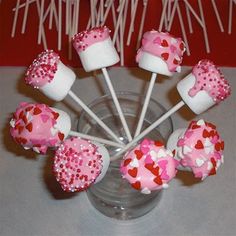 pink and white heart shaped marshmallows in a glass vase