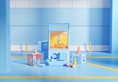 there is a blue room with yellow lines on the floor and an orange object in the middle