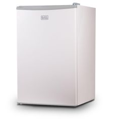 a white refrigerator freezer sitting on top of a white floor next to a wall