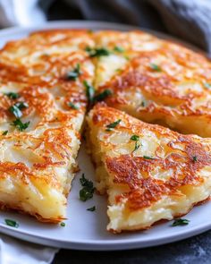 a white plate topped with cheese pizza on top of a table