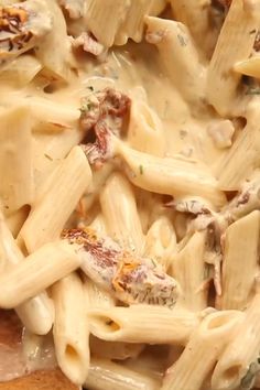 a close up view of some pasta and sauce