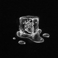 an ice cube with a heart in the middle and bubbles around it on a black background