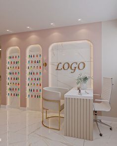 the interior of a nail salon with white marble floors and walls, decorated in gold trimmings