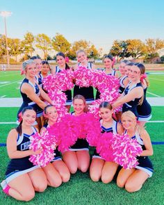 the cheerleaders are posing for a photo together