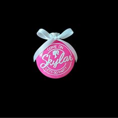 an ornament shaped like a candy bag with a bow on the top that says, come on skylar lets go crazy