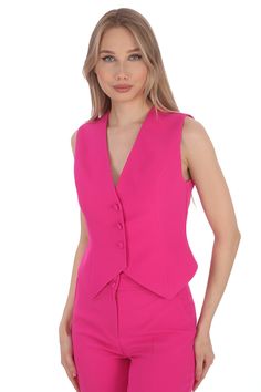 Elevate your style with our Women's Fuchsia Short Slim Fit Vest, a versatile piece that adds a pop of color to any ensemble. This sleeveless waistcoat is tailored to provide a flattering silhouette, making it perfect for both casual outings and formal occasions. Crafted from high-quality materials, it offers a comfortable fit and lightweight feel. The vibrant fuchsia hue makes a bold statement, ensuring you stand out wherever you go. Pair it effortlessly with jeans for a chic daytime look or layer it under a blazer for a polished office outfit. Available in various sizes, our vest caters to different body types, promising a comfortable and stylish fit for all. Discover the perfect blend of fashion and functionality with our Women's Fuchsia Short Slim Fit Vest. Explore our collection today Tailored Waistcoat, Sleeveless Waistcoat, Vest Outfits, Slim Fit Shorts, Office Outfits, Western Outfits, Look Chic, Formal Occasion, Womens Vest