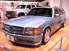 a mercedes benz wagon is on display at an auto show