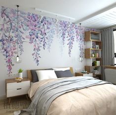 a bedroom decorated in pastel tones with flowers painted on the wall above the bed