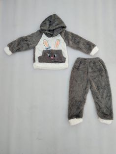 Elevate your child's winter wardrobe with our cozy and warm kids' woolen clothing set. This set includes a soft, woolen top and matching bottoms, designed to keep your little one snug and stylish throughout the chilly season. Crafted from premium quality wool, this clothing set provides excellent insulation while remaining gentle on your child's skin. Whether it's a snow day adventure or a family gathering, our woolen set ensures your child stays comfortably bundled up. Available in a variety of classic colors and patterns, this set is the perfect choice to keep your little one both toasty and trendy during the winter months. Cozy Playtime Sets For Fall, Cozy Winter Sleepover Sets, Winter Sets With Long Sleeves For Sleepover, Playful Winter Loungewear Sets, Winter Loungewear Sets, Cute Long Sleeve Sets For Winter, Cute Long Sleeve Winter Sets, Cute Winter Cotton Sets, Cute Cotton Winter Sets