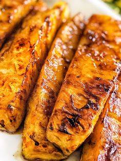 grilled pineapple copycat abacaxi on a white plate