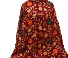 Pattern - red Kashmiri shawl with floral embroidery. Ideal for - women. Occasion - formal or casual. Fabric - cotts wool, it is a blend of cotton and wool which is very soft and has a fine texture. Color - maroon. On maroon background, embroidery is in different colored threads all over displaying floral patterns. Size - Width - 41 x 80 inches approx. Care- gentle hand wash. For more such scarves please visit- https://www.etsy.com/in-en/shop/vibrantscarves?ref=seller-platform-mcnav&section_i Elegant Red Shawl With Resham Embroidery, Embroidered Red Pashmina Shawl In Jamawar, Traditional Red Jamawar Shawl, Red Embroidered Shawl Scarf, Embroidered Red Pashmina Shawl, Elegant Embroidered Red Pashmina Shawl, Elegant Red Embroidered Shawl, Red Embroidered Pashmina Shawl, Red Embroidered Pashmina Scarves