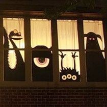 the windows are decorated with halloween decorations