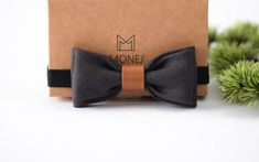 "Grey linen bow tie for boy is limited edition and is precisely handmade by me to bring a luxurious touch into classy look of your son. It will also serve as a wonderful baptism bowtie or wedding bow tie. It'll be good Christmas or Birthday gift to a kid who knows what style is all about.  A modern accessory is perfect for gifts, all you need to do is order a gift wrap. Do not stop yourself from being stylish! ▬ BOW TIE:  ▬ Color: grey. Please note, colors may vary due to your computer's setting Classic Bow Tie For Suit Accessories As Gift, Classic Ties With Bow Tie Back For Gifts, Classic Satin Bow Tie For Gift, Classic Satin Bow Tie As A Gift, Adjustable Detachable Bow Tie As Gift, Classic Bow Tie For Gifts, Adjustable Bow Tie For Gifts, Elegant Adjustable Bow Tie For Gift, Classic Detachable Bow As A Gift